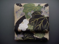 お茶を愛する人の帯 神坂雪佳 黒い葉と花の帯